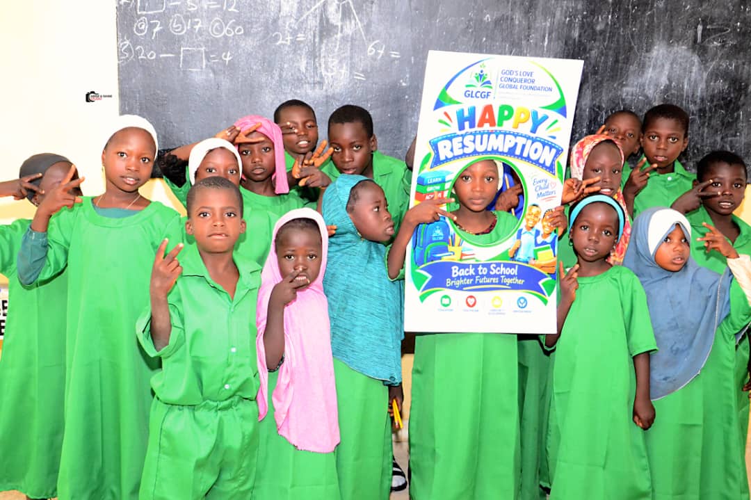 Pupils holding school books